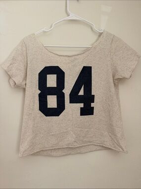 Brandy Melville John Galt Off the Shoulder Tee with Navy '84' Graphic